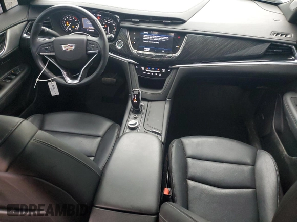 2021 Cadillac XT6 Premium Luxury z VIN 1GYKPCRS1MZ169952, wystawiony jako Copart lot #51908895 z przebiegiem 31 834 mil mil oraz Szkody całkowita. Historia ofert i sprzedaży dostępna na DreamBid. Obrazek 8.