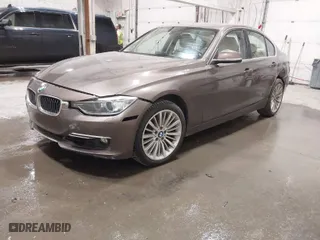 2014 BMW 3 Series 328i xDrive with VIN WBA3B3C58EJ980821, listed as a IAAI auction lot 41632452 with 59,801 mi miles. Bid and sale history available at carsss.com. Image 2.