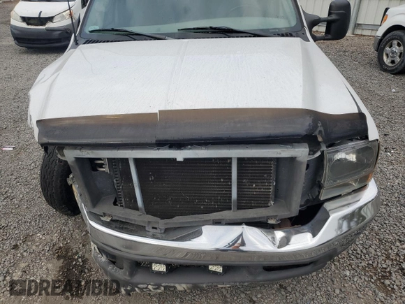 1999 Ford F-250 XL with VIN 1FTNX20L7XEC25827, listed as a Copart auction lot 44759535 with 174,119 mi miles and Salvage title. Bid and sale history available at DreamBid. Image 12.