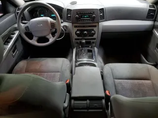 2007 Jeep Grand Cherokee Laredo z VIN 1J8GR48K57C580977, wystawiony jako Copart lot #57400605 z przebiegiem 208 268 mil mil oraz Czysty tytuł • Clean title. Historia ofert i sprzedaży dostępna na DreamBid. Obrazek 8.