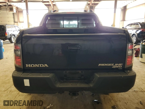 2013 Honda Ridgeline RTL with VIN 5FPYK1F50DB015599, listed as a Copart auction lot 50852074 with 159,411 mi miles and Salvage Title. Bid and sale history available at carsss.com. Image 6.