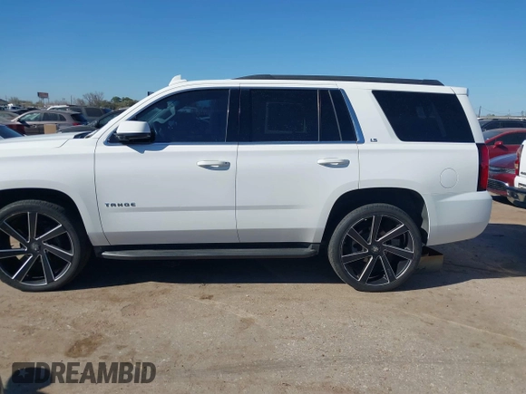 2015 Chevrolet Tahoe LS with VIN 1GNSCAKCXFR748554, listed as a IAAI auction lot 41765865 with 160,282 mi miles and . Bid and sale history available at DreamBid. Image 14.