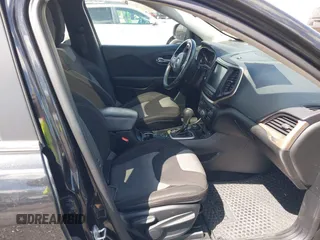 2014 Jeep Cherokee Latitude with VIN 1C4PJMCS8EW257959, listed as a IAAI auction lot 41987529 with 124,749 mi miles. Bid and sale history available at carsss.com. Image 5.