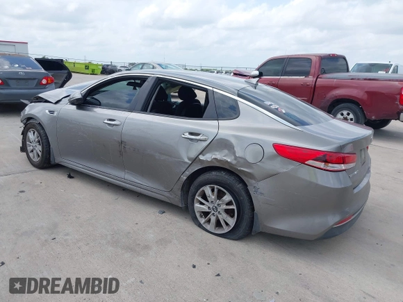 2018 Kia Optima LX with VIN 5XXGT4L38JG237631, listed as a IAAI auction lot 42286779 with 156,471 mi miles and . Bid and sale history available at DreamBid. Image 3.