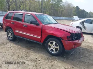 2005 Jeep Grand Cherokee Laredo with VIN 1J4HS48N95C711992, listed as a IAAI auction lot 41944696 with 209,299 mi miles and . Bid and sale history available at DreamBid. Image 1.