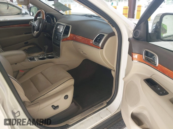 2011 Jeep Grand Cherokee Overland with VIN 1J4RR6GG0BC683624, listed as a IAAI auction lot 42729697 with 212,739 mi miles and . Bid and sale history available at DreamBid. Image 5.