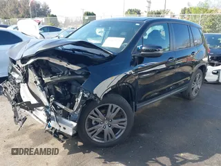 2021 Honda Passport EX-L with VIN 5FNYF7H5XMB013923, listed as a IAAI auction lot 41669295 with 42,969 mi miles. Bid and sale history available at carsss.com. Image 2.
