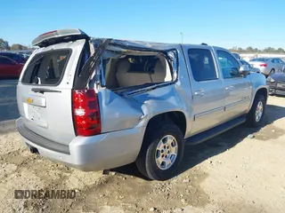 2013 Chevrolet Suburban LT with VIN 1GNSCJE03DR201530, listed as a IAAI auction lot 37988428 with 107,892 mi miles. Bid and sale history available at carsss.com. Image 4.