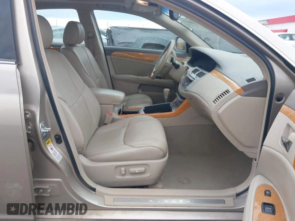 2005 Toyota Avalon XL with VIN 4T1BK36B55U020947, listed as a IAAI auction lot 41081514 with 134,045 mi miles and . Bid and sale history available at DreamBid. Image 5.