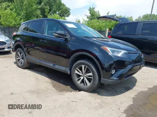 2018 Toyota RAV4 XLE with VIN 2T3WFREV3JW468450, listed as a IAAI auction lot 42528560 with 77,513 mi miles and . Bid and sale history available at DreamBid. Image 1.