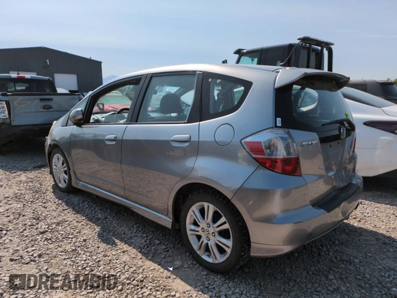 2010 Honda Fit Sport with VIN JHMGE8H41AC002070, listed as a Copart auction lot 62356565 with 148,279 mi miles and Salvage title. Bid and sale history available at DreamBid. Image 2.