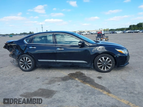 2016 Nissan Altima SV with VIN 1N4AL3AP5GC269179, listed as a IAAI auction lot 41304747 with 117,459 mi miles and . Bid and sale history available at DreamBid. Image 14.