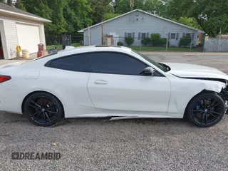 2021 BMW 4 Series 430i xDrive z VIN WBA73AP05MCG14970, wystawiony jako IAAI lot #42335790 z przebiegiem 69 926 mil mil oraz . Historia ofert i sprzedaży dostępna na DreamBid. Obrazek 14.