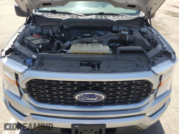2021 Ford F-150 XL z VIN 1FTEW1EP5MKE42668, wystawiony jako Copart lot #57350175 z przebiegiem 39 727 mil mil oraz Szkoda całkowita • Salvage title. Historia ofert i sprzedaży dostępna na DreamBid. Obrazek 11.