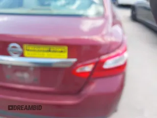 2016 Nissan Altima SR with VIN 1N4AL3AP9GC261277, listed as a IAAI auction lot 42101629 with 192,380 mi miles and . Bid and sale history available at carsss.com. Image 6.