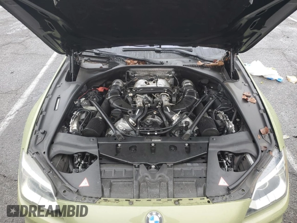2013 BMW 6 Series 650i with VIN WBA6B2C59DDG66909, listed as a Copart auction lot 86329014 with 131,054 mi miles and Salvage Title. Bid and sale history available at DreamBid. Image 11.
