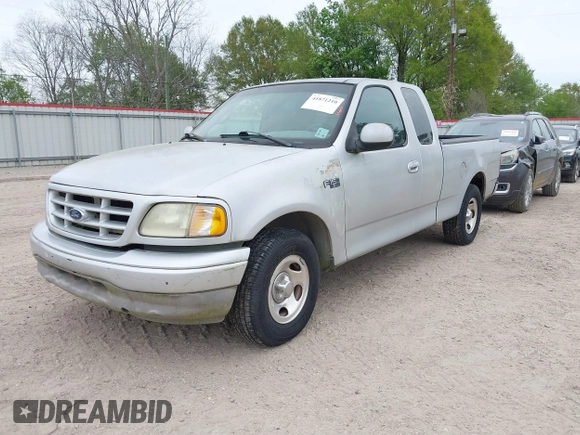 2002 Ford F-150 XL with VIN 1FTRX17282NA84011, listed as a IAAI auction lot 41871210 with 1 mi miles. Bid and sale history available at carsss.com. Image 2.
