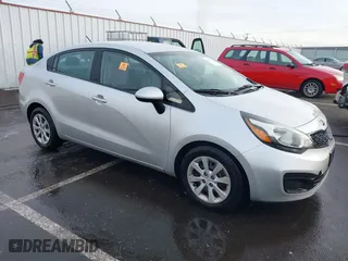 2015 Kia Rio LX with VIN KNADM4A31F6441029, listed as a IAAI auction lot 41371612 with 1 mi miles. Bid and sale history available at carsss.com. Image 1.