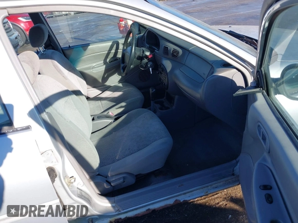 1999 Ford Escort SE z VIN 1FAFP13P8XW185612, wystawiony jako IAAI lot #41097304 z przebiegiem 221 752 mil mil oraz . Historia ofert i sprzedaży dostępna na DreamBid. Obrazek 5.