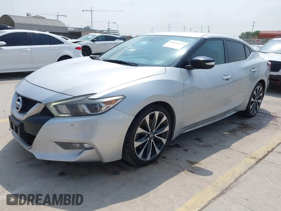 2017 Nissan Maxima SR z VIN 1N4AA6AP9HC397126, wystawiony jako IAAI lot #42291477 z przebiegiem 115 201 mil mil oraz . Historia ofert i sprzedaży dostępna na DreamBid. Obrazek 2.