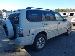 2005 Suzuki XL7 LX z VIN JS3TX92V654108629, wystawiony jako IAAI lot #40821874 z przebiegiem 157 926 mil mil oraz . Historia ofert i sprzedaży dostępna na DreamBid. Obrazek 4.