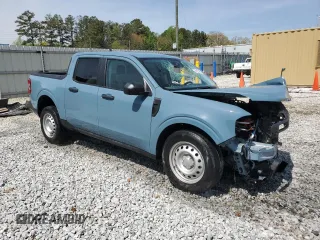 2023 Ford Maverick XL with VIN 3FTTW8E96PRA21351, listed as a Copart auction lot 51225165 with 36,387 mi miles and Salvage Title. Bid and sale history available at DreamBid. Image 4.