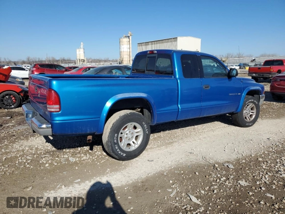 2001 Dodge Dakota SLT with VIN 1B7GG22X01S283618, listed as a Copart auction lot 42608555 with 142,307 mi miles and Salvage Title. Bid and sale history available at DreamBid. Image 3.