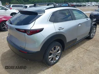 2021 Mazda CX-30 Select with VIN 3MVDMBBL1MM245514, listed as a IAAI auction lot 42517295 with 71,270 mi miles and . Bid and sale history available at DreamBid. Image 4.