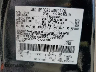 2012 Ford Escape XLS with VIN 1FMCU9C71CKA30319, listed as a Copart auction lot 60189745 with 214,736 mi miles and Salvage title. Bid and sale history available at DreamBid. Image 13.