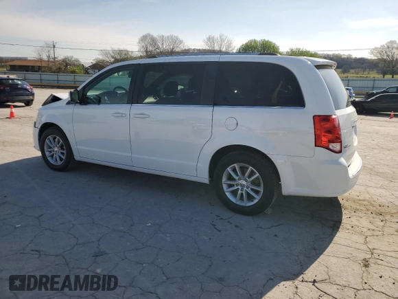 2019 Dodge Grand Caravan SXT with VIN 2C4RDGCG8KR724184, listed as a Copart auction lot 51268545 with 112,576 mi miles and Salvage Title. Bid and sale history available at DreamBid. Image 2.
