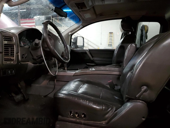 2005 Nissan Titan SE z VIN 1N6AA06BX5N502595, wystawiony jako Copart lot #85888184 z przebiegiem 231 851 mil mil oraz Nie do naprawy • Non repairable. Historia ofert i sprzedaży dostępna na DreamBid. Obrazek 7.