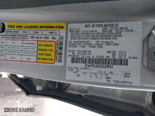 2014 Ford Fusion SE Hybrid with VIN 3FA6P0LU6ER334941, listed as a IAAI auction lot 41444793 with 144,332 mi miles. Bid and sale history available at carsss.com. Image 9.