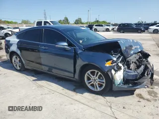 2018 Ford Fusion SE z VIN 3FA6P0HD7JR180095, wystawiony jako Copart lot #55980745 z przebiegiem 76 994 mil mil oraz Czysty tytuł • Clean title. Historia ofert i sprzedaży dostępna na DreamBid. Obrazek 4.