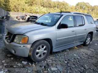 2004 GMC Envoy SLE with VIN 1GKET12S746181543, listed as a Copart auction lot 75818784 with 146,289 mi miles and Salvage Title. Bid and sale history available at DreamBid. Image 1.