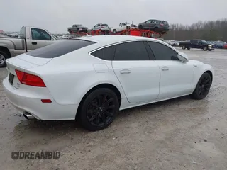 2014 Audi A7 Premium Plus z VIN WAUWGAFC0EN083417, wystawiony jako IAAI lot #41350273 z przebiegiem 163 402 mil mil oraz . Historia ofert i sprzedaży dostępna na DreamBid. Obrazek 4.