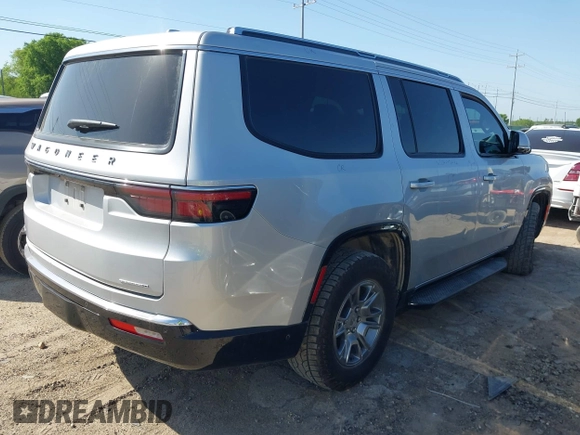 2022 Jeep Wagoneer Series I with VIN 1C4SJVATXNS227350, listed as a IAAI auction lot 42001511 with 70,068 mi miles and . Bid and sale history available at DreamBid. Image 4.