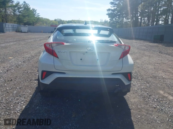 2019 Toyota C-HR XLE with VIN NMTKHMBX5KR097682, listed as a IAAI auction lot 42145372 with 11,003 mi miles and . Bid and sale history available at DreamBid. Image 16.
