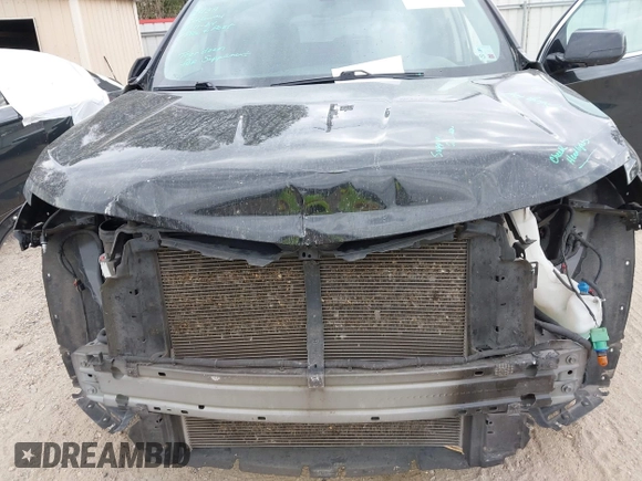 2021 Chevrolet Traverse LS z VIN 1GNERFKW1MJ103824, wystawiony jako IAAI lot #40975072 z przebiegiem 110 013 mil mil oraz . Historia ofert i sprzedaży dostępna na DreamBid. Obrazek 10.