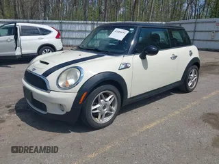 2007 MINI Hardtop S with VIN WMWMF73567TT84033, listed as a IAAI auction lot 42189573 with 75,177 mi miles and . Bid and sale history available at DreamBid. Image 2.