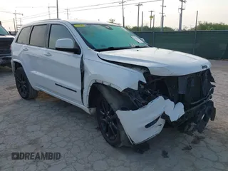 2017 Jeep Grand Cherokee Laredo with VIN 1C4RJEAG1HC720656, listed as a IAAI auction lot 42263500 with 184,239 mi miles and . Bid and sale history available at DreamBid. Image 1.