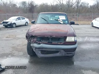 2003 Mazda B-Series 2WD Truck DS with VIN 4F4YR16U83TM17272, listed as a IAAI auction lot 41387645 with 162,810 mi miles. Bid and sale history available at carsss.com. Image 12.