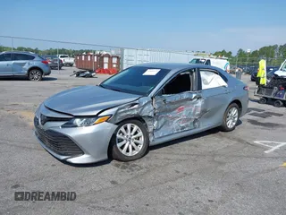 2020 Toyota Camry LE with VIN 4T1C11AK9LU341762, listed as a IAAI auction lot 42001577 with 84,991 mi miles and . Bid and sale history available at DreamBid. Image 17.