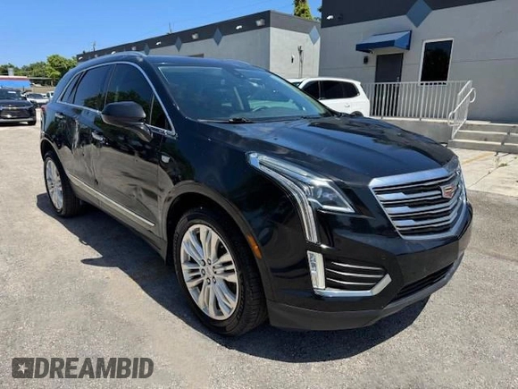 2018 Cadillac XT5 Premium Luxury FWD with VIN 1GYKNERS6JZ139813, listed as a Copart auction lot 65519875 with 96,567 mi miles and Non repairable. Bid and sale history available at DreamBid. Image 4.