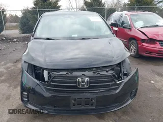 2023 Honda Odyssey Touring with VIN 5FNRL6H81PB068721, listed as a IAAI auction lot 41489618 with 20,202 mi miles and . Bid and sale history available at DreamBid. Image 13.