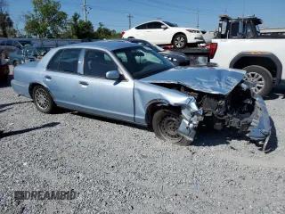 1999 Mercury Grand Marquis GS z VIN 2MEFM74W5XX711421, wystawiony jako Copart lot #53062605 z przebiegiem 106 913 mil mil oraz Nie do naprawy • Non repairable. Historia ofert i sprzedaży dostępna na DreamBid. Obrazek 4.