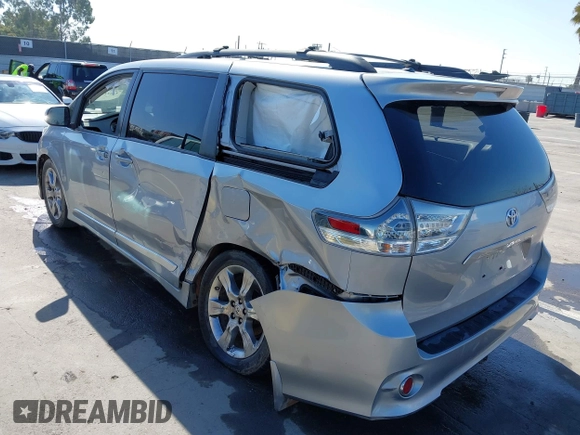 2012 Toyota Sienna SE with VIN 5TDXK3DC3CS189064, listed as a IAAI auction lot 42022390 with 193,016 mi miles and . Bid and sale history available at DreamBid. Image 3.