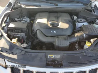2014 Jeep Grand Cherokee Overland with VIN 1C4RJECGXEC529438, listed as a Copart auction lot 45693285 with 154,674 mi miles and Salvage Title. Bid and sale history available at carsss.com. Image 12.