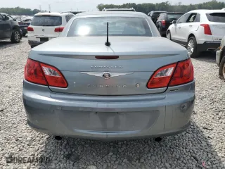 2010 Chrysler Sebring Limited with VIN 1C3BC6EV5AN144868, listed as a Copart auction lot 66549774 with 106,602 mi miles and Salvage Title. Bid and sale history available at carsss.com. Image 6.
