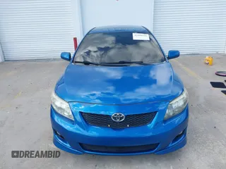 2009 Toyota Corolla with VIN 2T1BU40E69C154781, listed as a IAAI auction lot 42009936 with 180,039 mi miles. Bid and sale history available at carsss.com. Image 12.