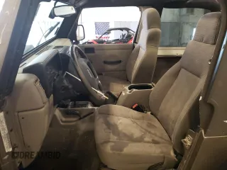 2004 Jeep Wrangler Rubicon z VIN 1J4FA69S44P784141, wystawiony jako Copart lot #55235305 z przebiegiem 125 564 mil mil oraz Szkoda całkowita • Salvage title. Historia ofert i sprzedaży dostępna na DreamBid. Obrazek 7.